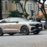 Audi Q9 на тлі американської автодороги — новий флагманський позашляховик
